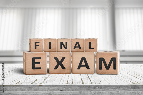 Final exam sign in a bright education room