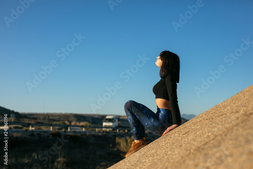 Woman doing sport and relaxing outdoors