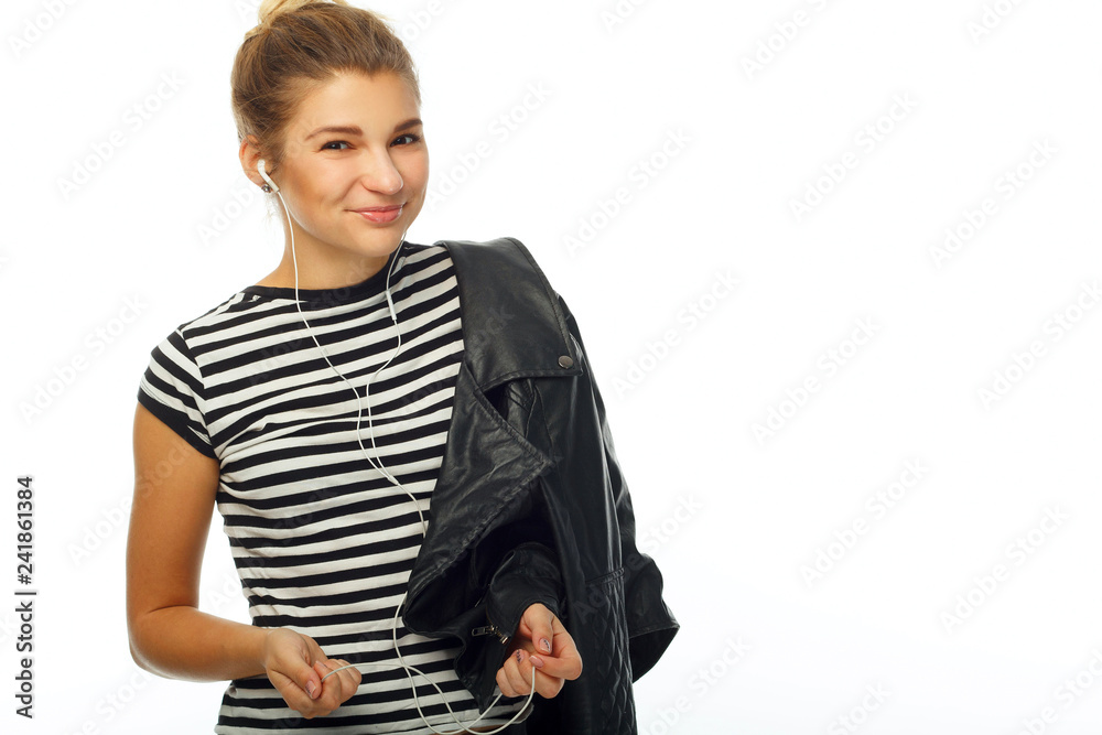Beauty portrait of young adorable fresh looking blonde woman listening to the music Beauty portrait of young adorable fresh looking blonde woman listening to the music