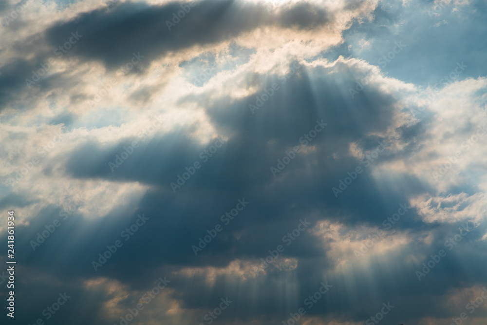 Sun rays through clouds like an dramatic explosion Sun rays through clouds like an dramatic explosion