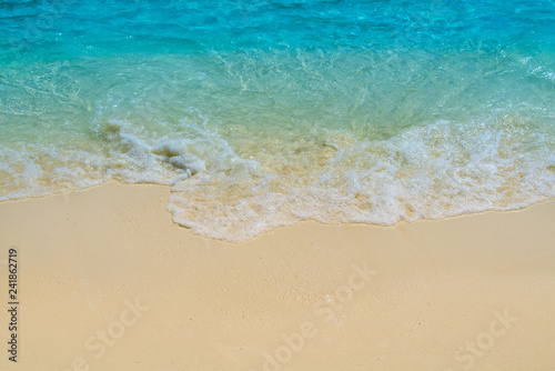Wave of tropical sea beach on white sand © happystock