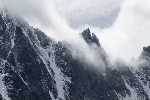 Detail of mountain in the clouds in Alps, Austria