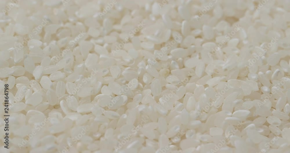 Stack of white uncooked rice Stack of white uncooked rice