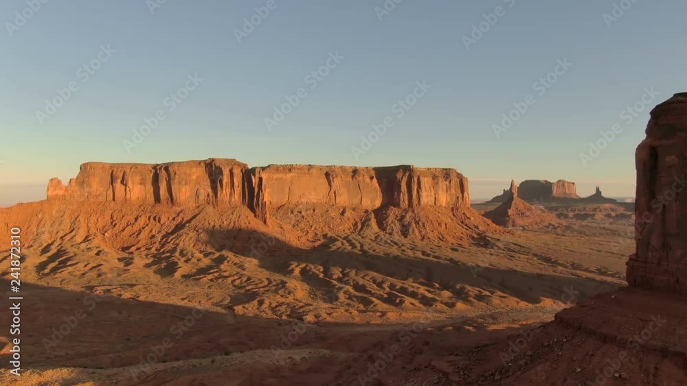 Monument Valley Sunrise West Mitten Butte and Sentinel Mesa Aerial Telephoto Shot Monument Valley Sunrise West Mitten Butte and Sentinel Mesa Aerial Telephoto Shot