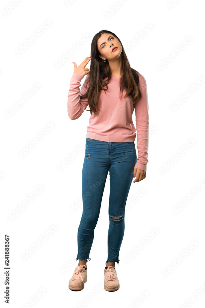 A full-length shot of a Teenager girl with pink shirt with problems making suicide gesture A full-length shot of a Teenager girl with pink shirt with problems making suicide gesture