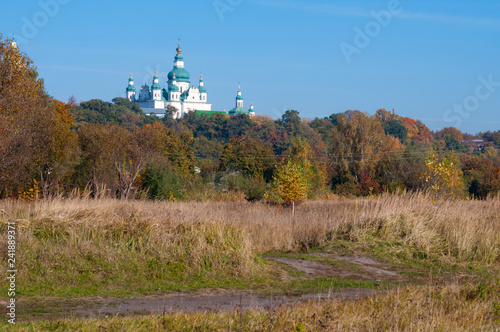 Beautiful autumn landscape nature and church. Ukraine  Chernihiv city  Trinity Cathedral