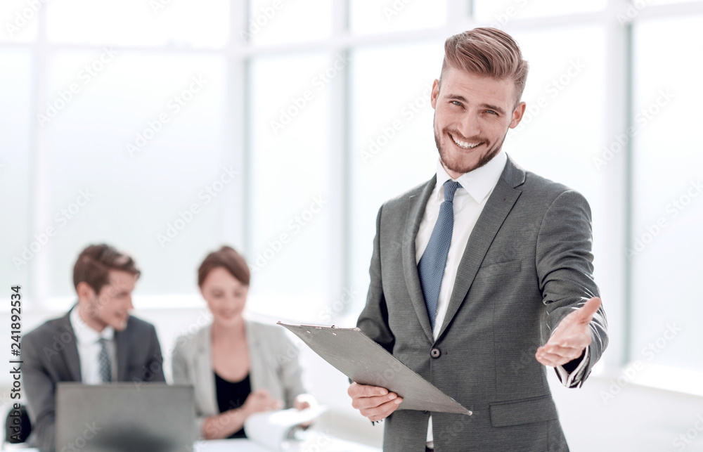 friendly businessman inviting to his office friendly businessman inviting to his office