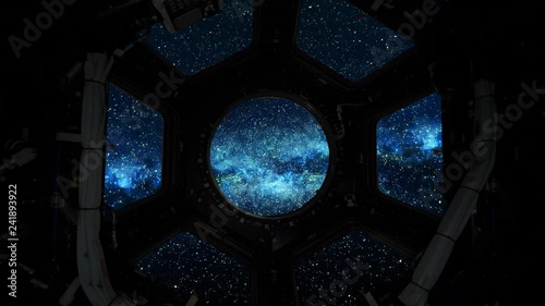 CGI depiction of space flight into a star field captured through a space shuttle window.
