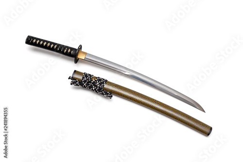 Black cord tie on grip Japanese sword and textured scabbard with steel fitting isolated in white background. 