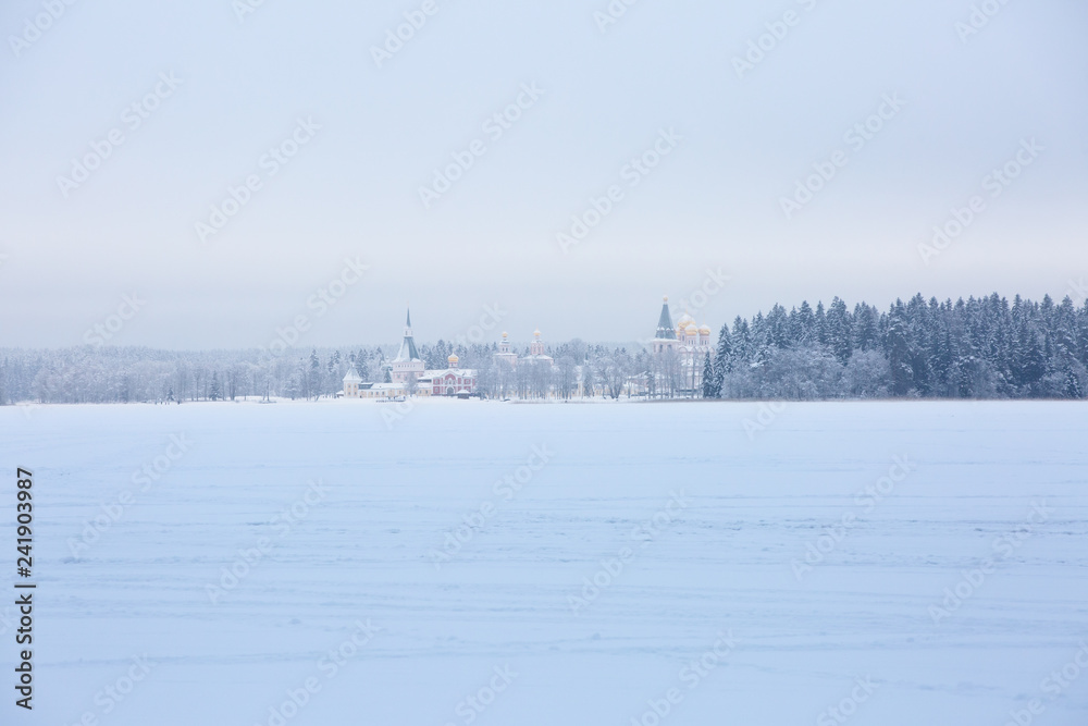 Lanscape  forest  Orthodox churches in another side of frozen lake