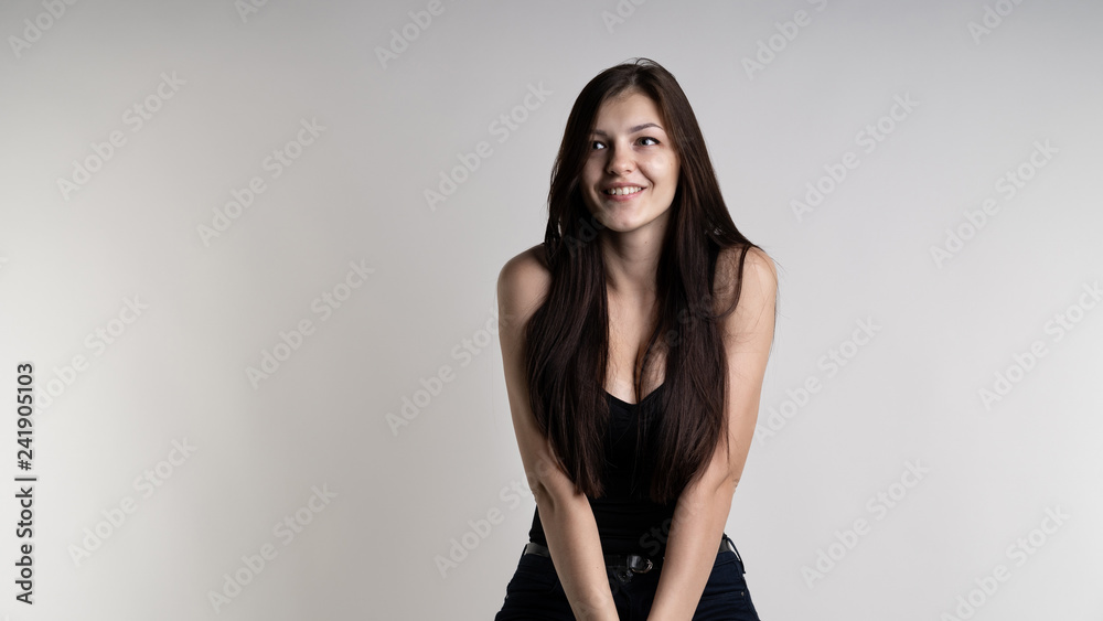 beautiful girl with a black hair and big boobs smiling Stock Photo