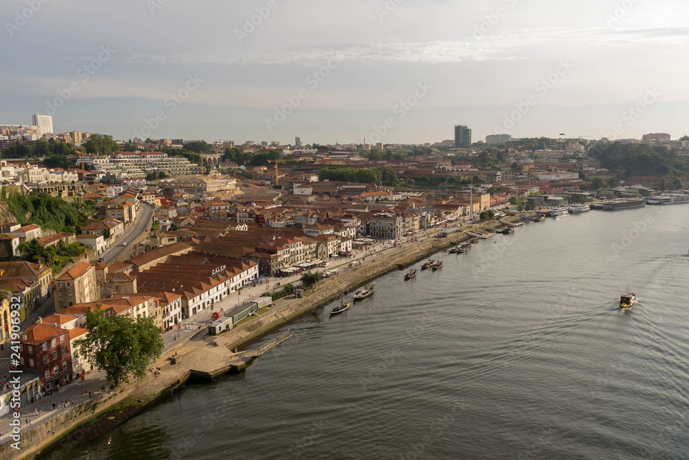 View of Porto in Portugal. Douro floating in valley. View of Porto in Portugal. Douro floating in valley.