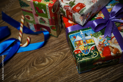 Gifts with bow and candy © Andrey
