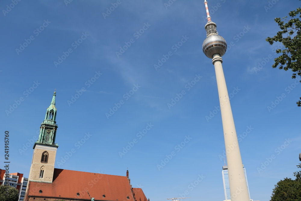 Berlin TV Tower and St. Mary's Church at Alexanderplatz in Berlin, Germany