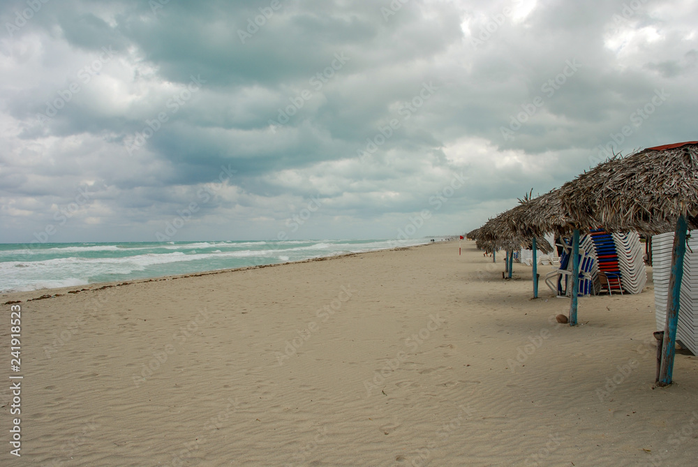 the beach is deserted during a storm