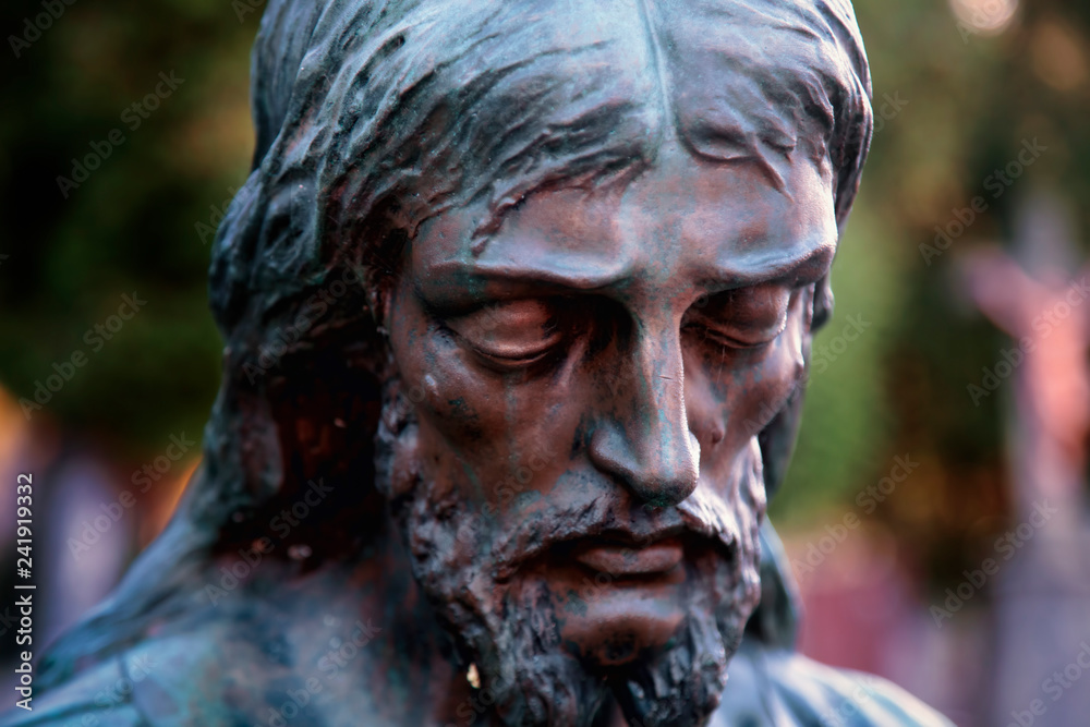 Antique statue of suffering of Jesus Christ. Religion, faith, death, resurrection concept.