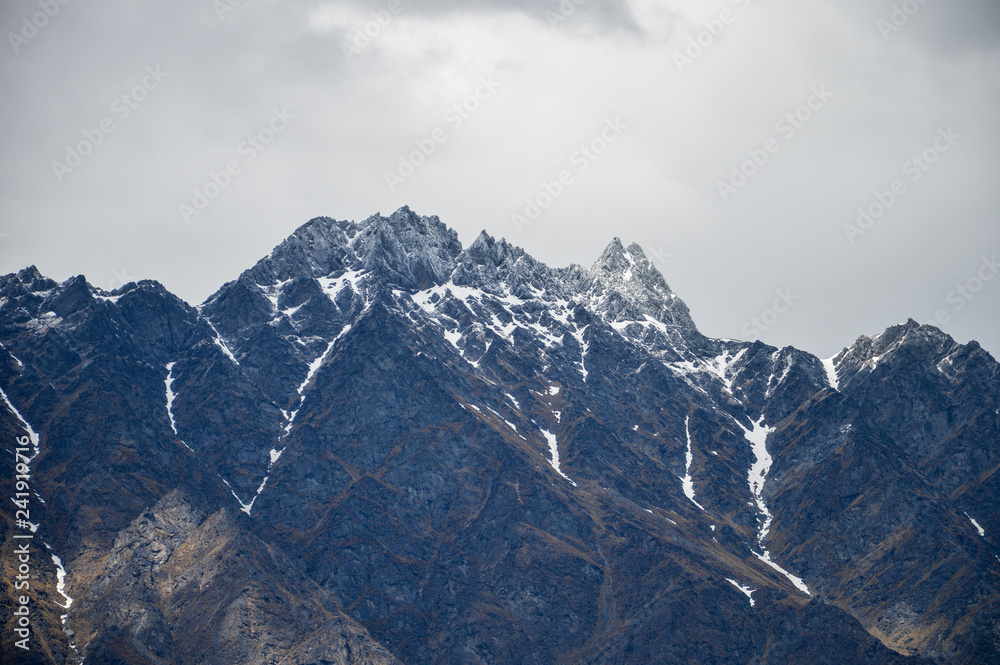 Mountain rainge with snow and clouds