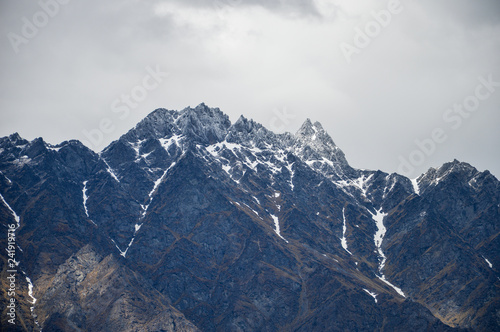 Mountain rainge with snow and clouds