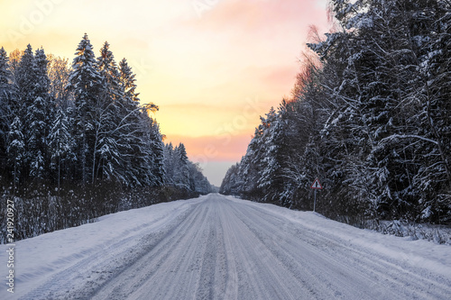winter road at the sunset photo