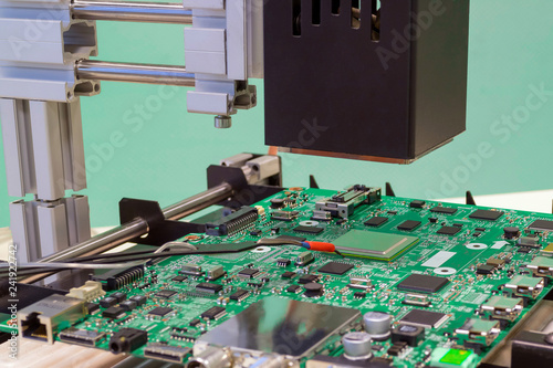 Replacing chip in rework station. Infrared soldering station