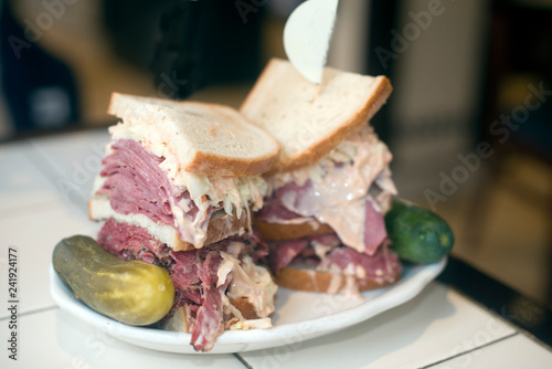 Kosher deli combination sandwich pastrami corned beef tongue cole slaw and Russian dressing