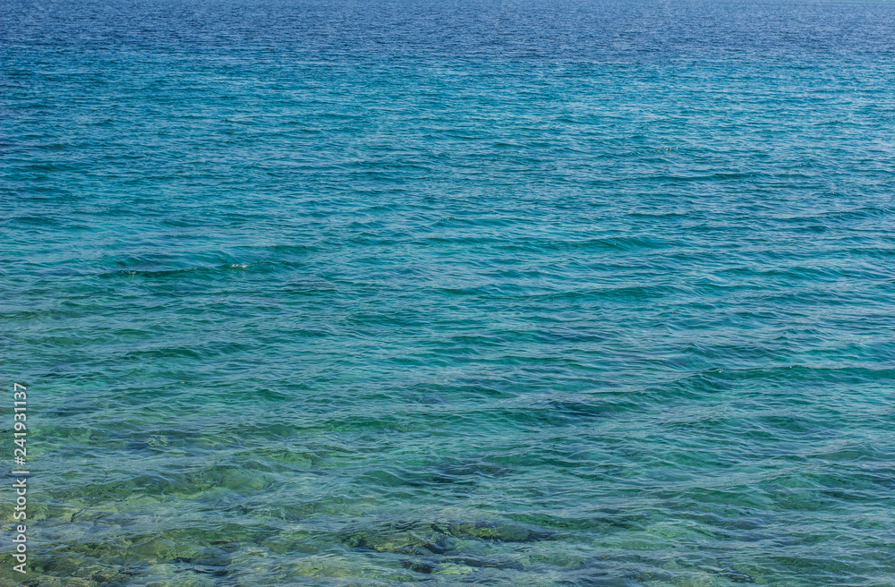 tropic sea vivid blue water surface with small waves background wallpaper pattern tropic sea vivid blue water surface with small waves background wallpaper pattern