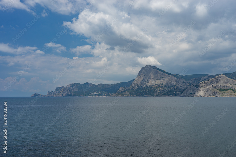 Marine landscape with views of the rocky coast of Sudak in the Crimea. Marine landscape with views of the rocky coast of Sudak in the Crimea.