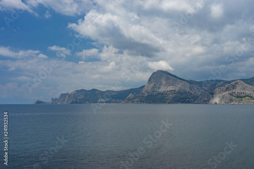 Marine landscape with views of the rocky coast of Sudak in the Crimea.