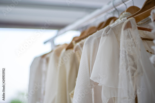 Wedding dresses hanging on hanger in Wedding shop