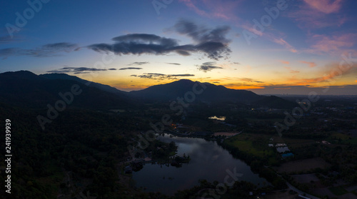 Aerial view. of sunset or sunrise and blue sky on the mountains Twilight sky. © Sunday Stock