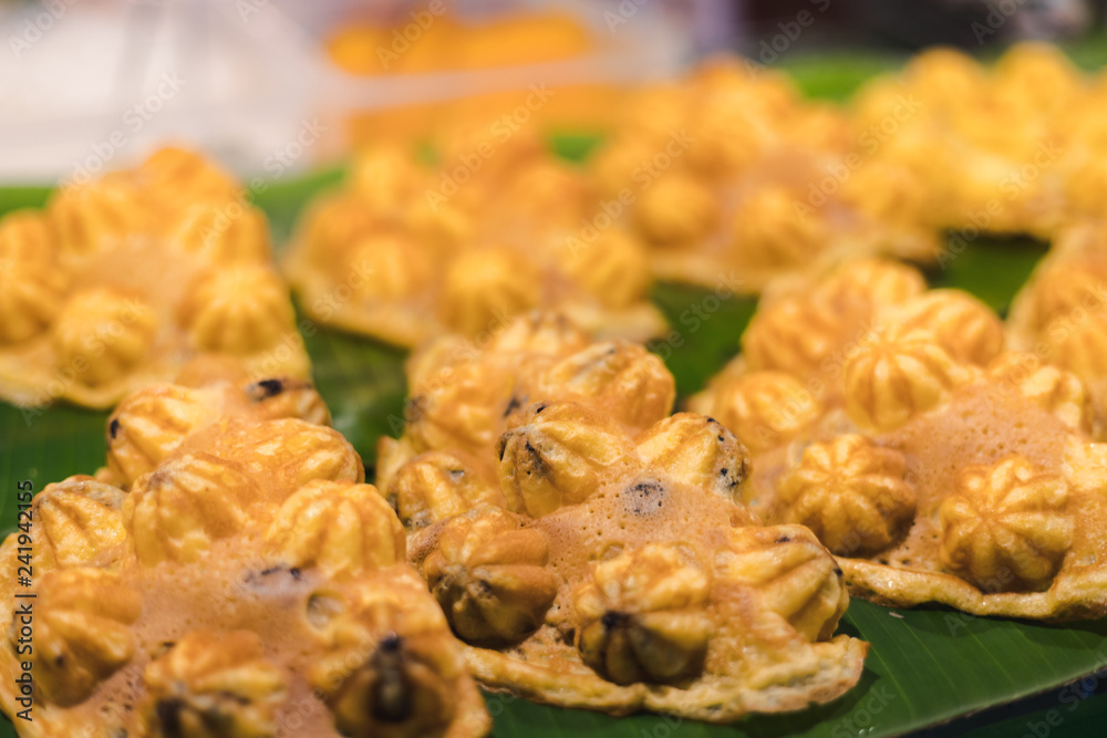 Thai dessert made with flour without topping on it but can taste sweet inside of it