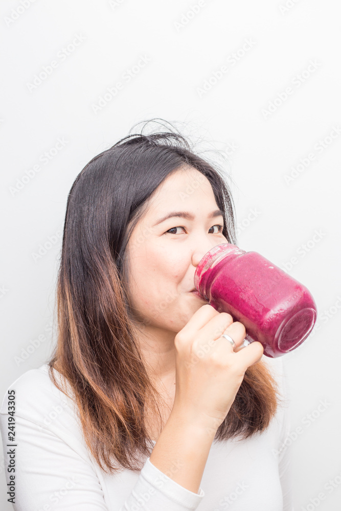 Asian wellnes women with blue berry smoothies summer drink Asian wellnes women with blue berry smoothies summer drink