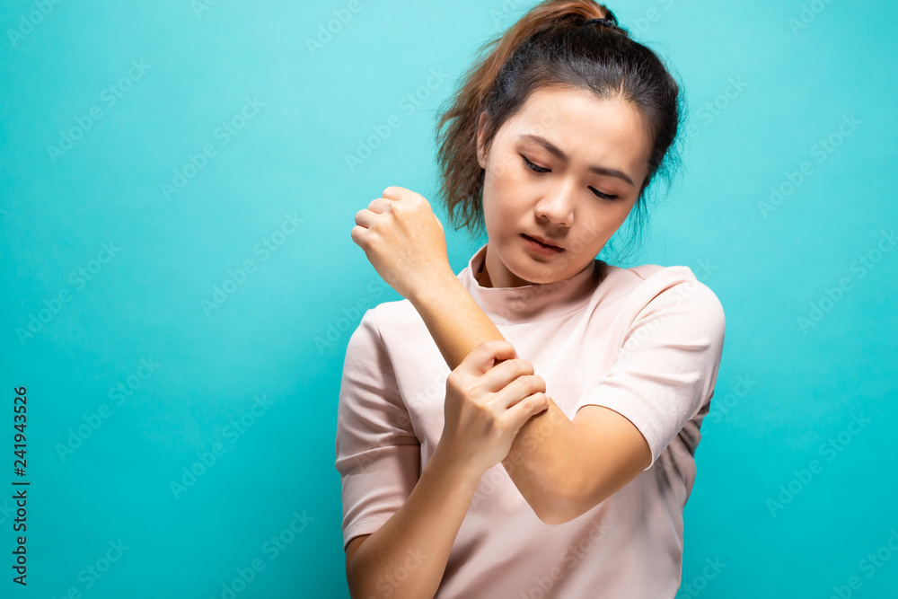 Woman suffering from arm pain Woman suffering from arm pain