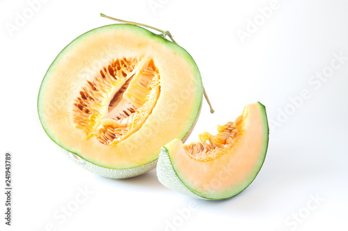 Half and sliced Japanese melons isolated on white background. Healthy fruit