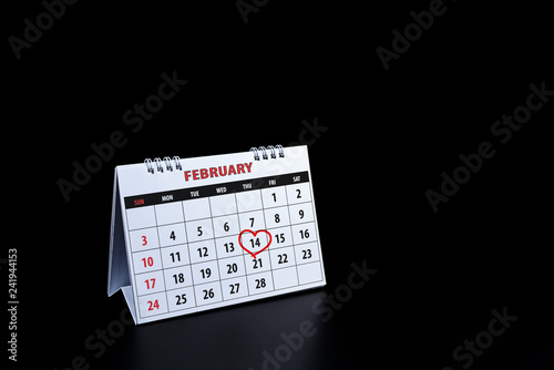 Calendar with red hand written heart highlight on February 14 of Saint Valentines day