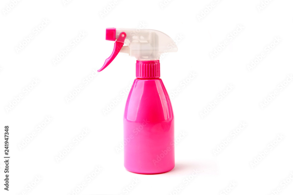 Water sprayer isolated on white background. Small plastic pink garden sprayer. Water sprayer isolated on white background. Small plastic pink garden sprayer.