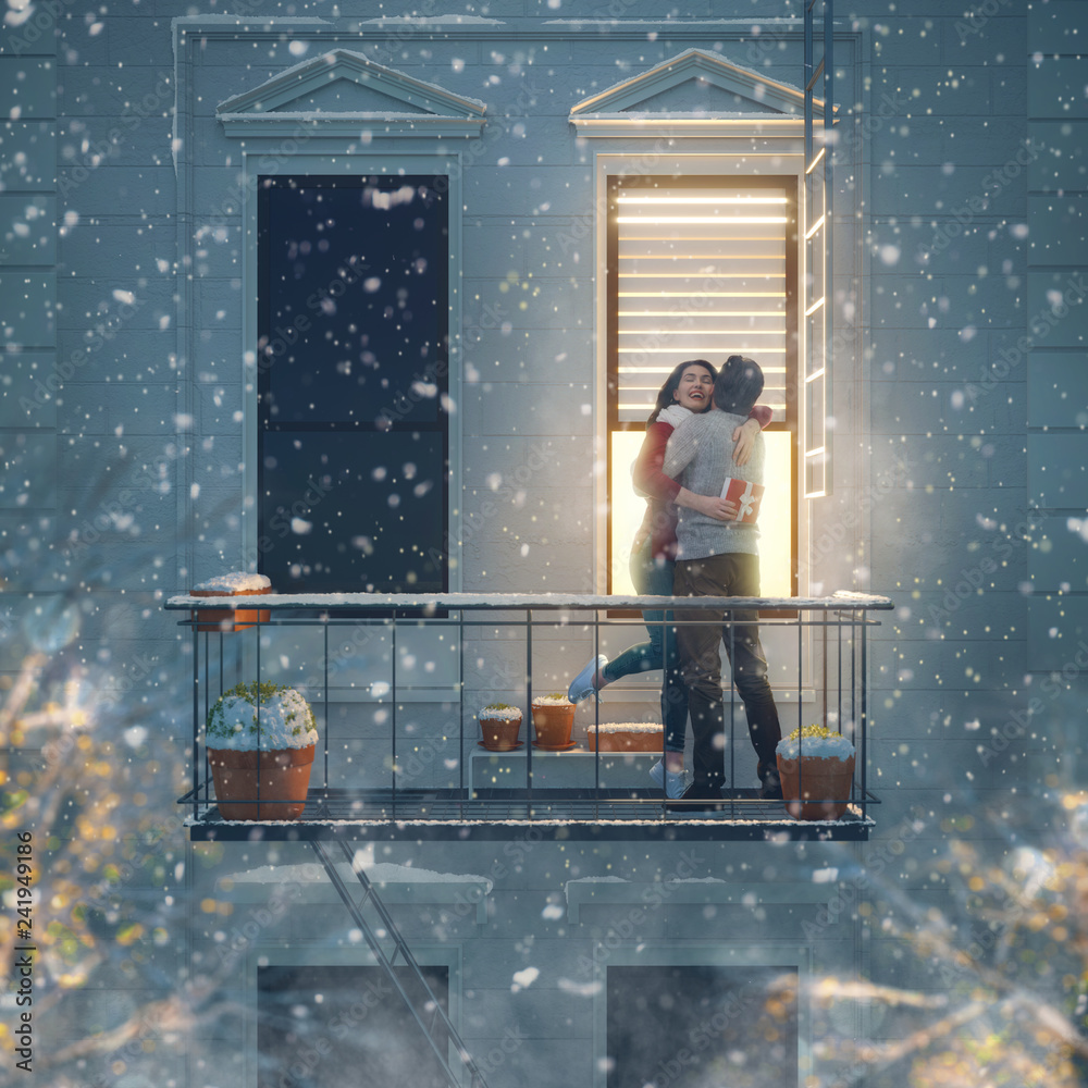 couple on balcony on Valentine's day couple on balcony on Valentine's day