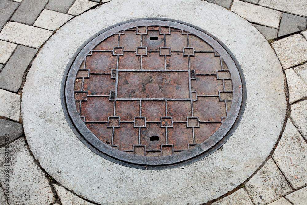 old manhole cover