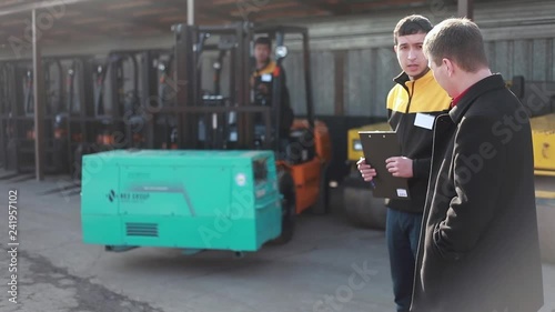 Man drives a reliable heavy truck loader
