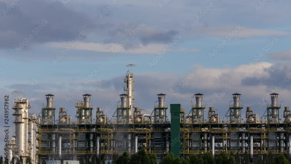 time lapse of petroleum and petrochemical plant for chemical product in industrial zone with moving of rainy cloud time lapse of petroleum and petrochemical plant for chemical product in industrial zone with moving of rainy cloud