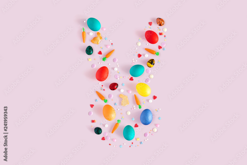 Top view and flat lay of arrangement decoration Happy Easter, holiday background concept. Colorful bunny cookies, eggs and topping ornament design as big rabbit on pink pastel desk with copy space. Top view and flat lay of arrangement decoration Happy Easter, holiday background concept. Colorful bunny cookies, eggs and topping ornament design as big rabbit on pink pastel desk with copy space.