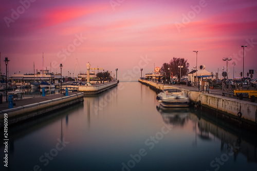 View of the Port at sunset. Long exposure picture in Riccione, Emilia Romagna, Italy. photo