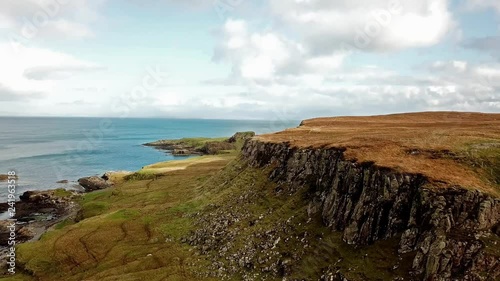 Flying over the Dinosaur bay with the rare Dinosaur footprint of the sauropod-dominated tracksite from Rubha nam Brathairean, Brothers Point - Isle of Skye, Scotland photo