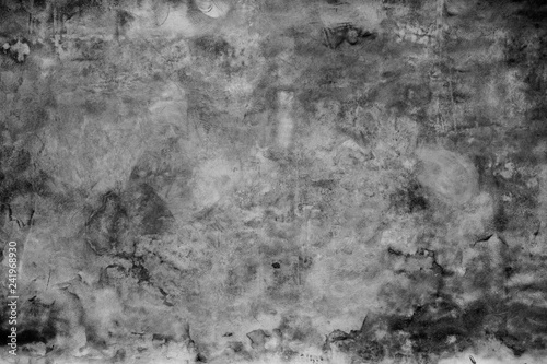 Grunge dark grey concrete cement wall.