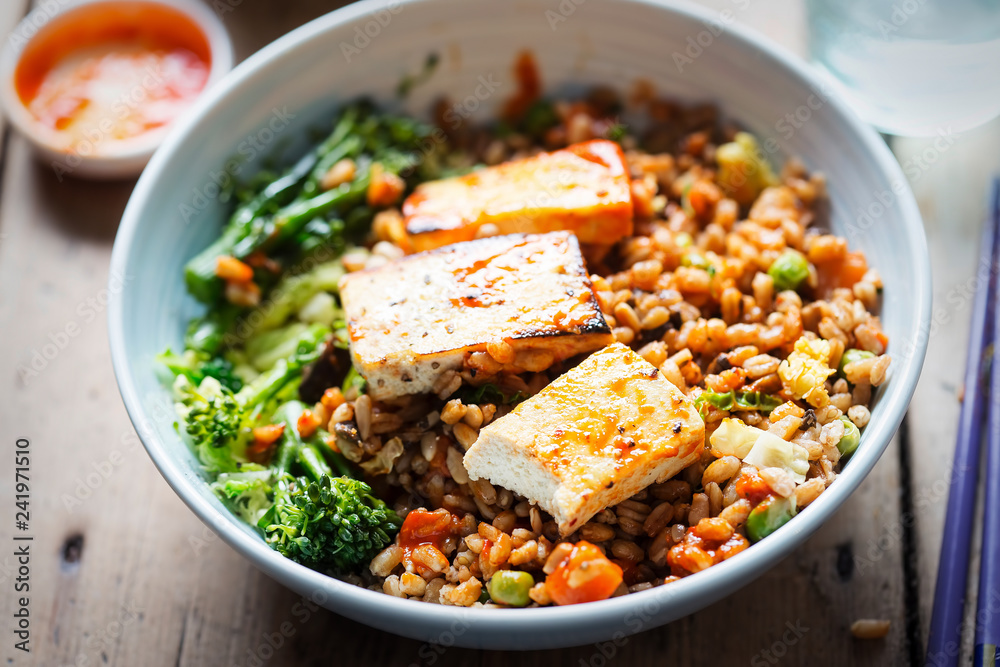 Spelt, broccoli, savoy cabbage with chargrilled tofu with sriracha Spelt, broccoli, savoy cabbage with chargrilled tofu with sriracha