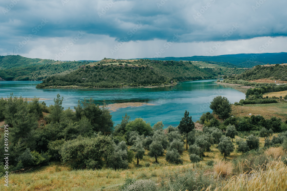 Fototapeta premium Beautiful Nature Landscape with lake and blue sky.