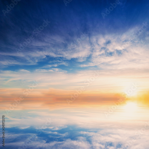 Background sky during sunset and water reflections