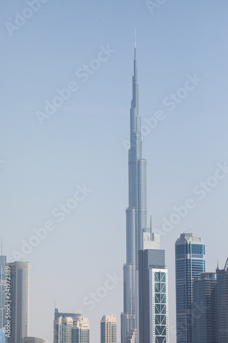 Beautiful architectural background. Panoramic view of Dubai's business bay at sunset.