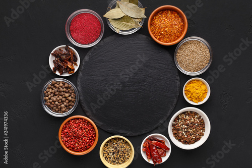 Assorted indian spices in circle with space for text