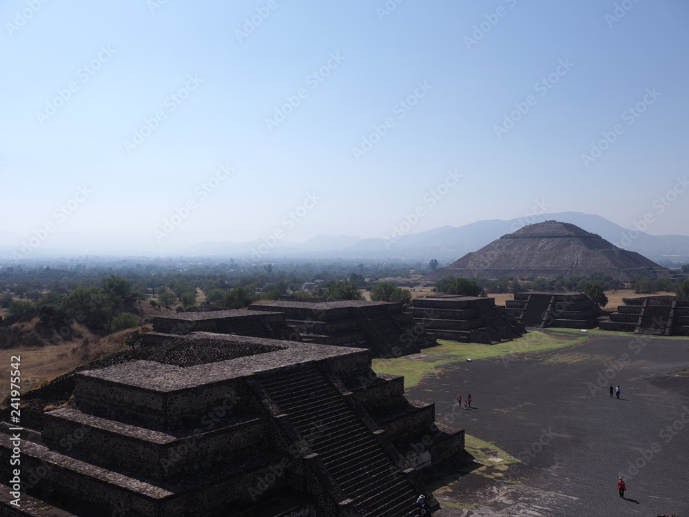 Brilliant Avenue of the Dead and pyramid of the Sun on left at Teotihuacan ruins near Mexico city landscape Brilliant Avenue of the Dead and pyramid of the Sun on left at Teotihuacan ruins near Mexico city landscape